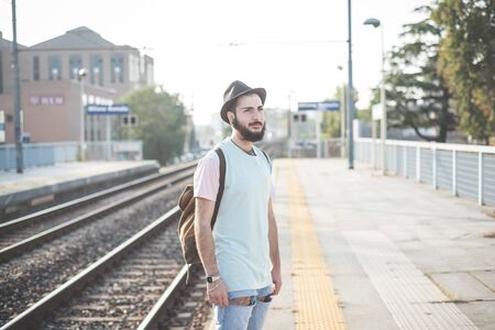 young handsome hipster gay modern man in townの写真素材
