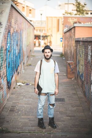 young handsome hipster gay modern man in townの写真素材
