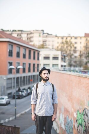 young handsome hipster gay modern man in townの写真素材
