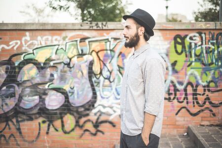 young handsome hipster gay modern man in townの写真素材