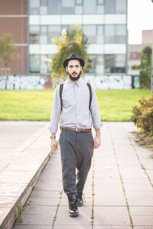 young handsome hipster gay modern man in townの写真素材