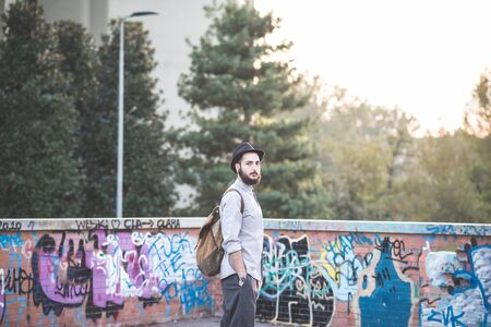 young handsome hipster gay modern man in townの写真素材