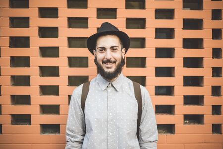 young handsome hipster gay modern man in townの写真素材