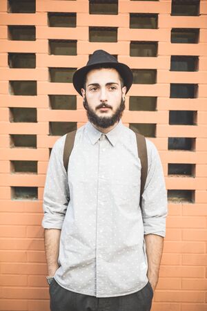 young handsome hipster gay modern man in townの写真素材