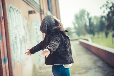 young beautiful brunette woman in the cityの写真素材