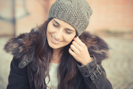 young beautiful brunette woman in the cityの写真素材