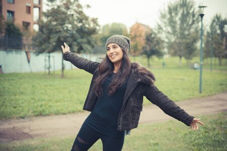 young beautiful brunette woman in the cityの写真素材