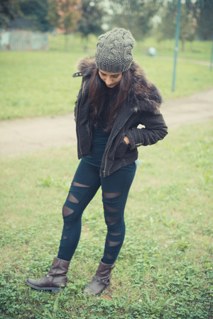 young beautiful brunette woman in the cityの写真素材