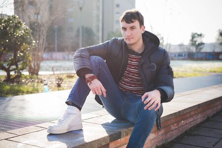 young handsome man in the cityの写真素材