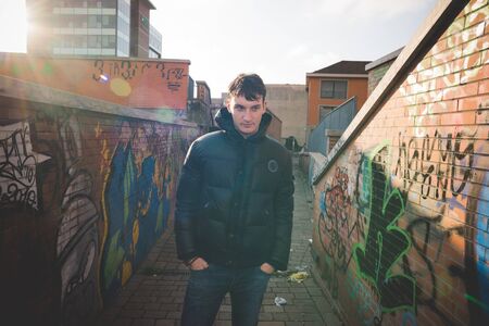 young handsome man in the cityの写真素材