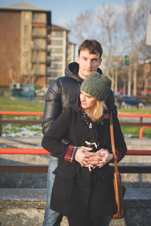 young couple lovers authentic in the cityの写真素材