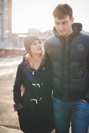 young couple lovers authentic in the cityの写真素材