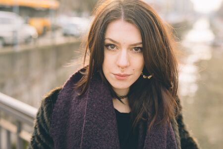 young beautiful woman in the cityの写真素材