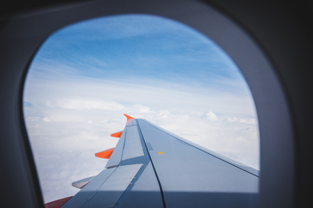 Wing aircraft in altitude during flightのeditorial素材