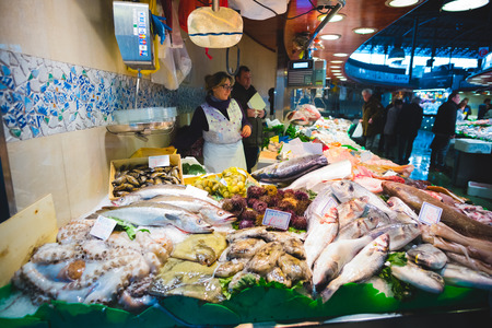 BARCELONA, SPAIN - MARCH 21: La rambla Boqueria marketplace on March 21, 2015. Boqueria is the most famous marketplace in Barcelona, in front of la rambla street.のeditorial素材