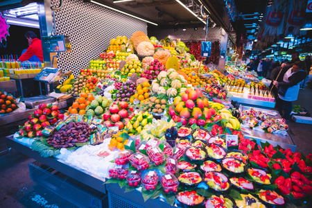 BARCELONA, SPAIN - MARCH 21: La rambla Boqueria marketplace on March 21, 2015. Boqueria is the most famous marketplace in Barcelona, in front of la rambla street.のeditorial素材