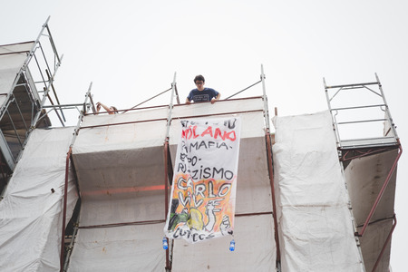 MILAN, ITALY - MAY 05: Students manifestation held in Milan on May, 5 2015. Students and teachers took to the streets to protest against new laws on education by minister Stefania Gianniniのeditorial素材