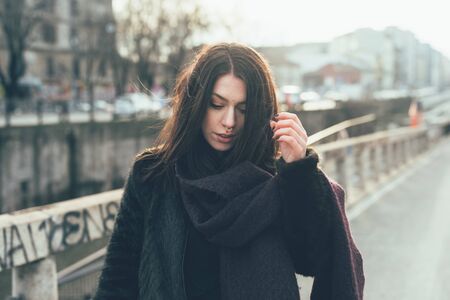 young beautiful woman in the cityの写真素材