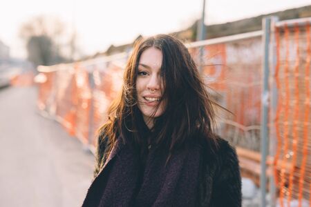 young beautiful woman in the cityの写真素材