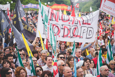 MILAN, ITALY - MAY 05: Students manifestation held in Milan on May, 5 2015. Students and teachers took to the streets to protest against new laws on education by minister Stefania Gianniniのeditorial素材