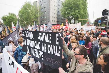 MILAN, ITALY - MAY 05: Students manifestation held in Milan on May, 5 2015. Students and teachers took to the streets to protest against new laws on education by minister Stefania Gianniniのeditorial素材