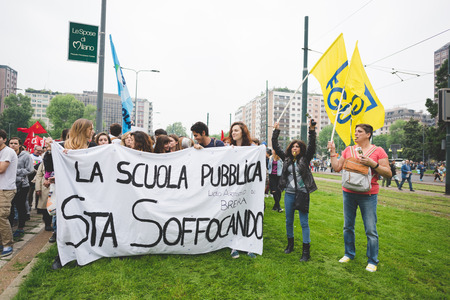 MILAN, ITALY - MAY 05: Students manifestation held in Milan on May, 5 2015. Students and teachers took to the streets to protest against new laws on education by minister Stefania Gianniniのeditorial素材