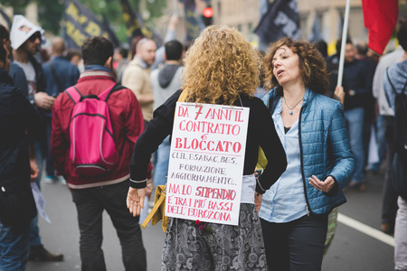 MILAN, ITALY - MAY 05: Students manifestation held in Milan on May, 5 2015. Students and teachers took to the streets to protest against new laws on education by minister Stefania Gianniniのeditorial素材