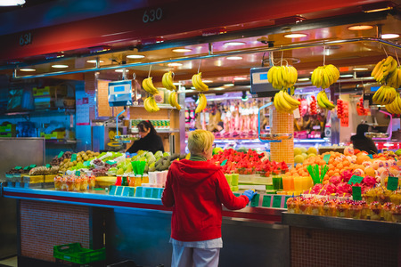 BARCELONA, SPAIN - MARCH 21: La rambla Boqueria marketplace on March 21, 2015. Boqueria is the most famous marketplace in Barcelona, in front of la rambla street.のeditorial素材