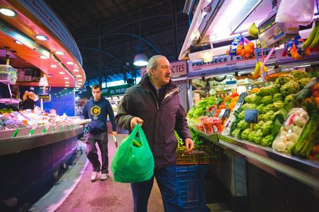 BARCELONA, SPAIN - MARCH 21: La rambla Boqueria marketplace on March 21, 2015. Boqueria is the most famous marketplace in Barcelona, in front of la rambla street.のeditorial素材