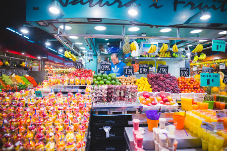 BARCELONA, SPAIN - MARCH 21: La rambla Boqueria marketplace on March 21, 2015. Boqueria is the most famous marketplace in Barcelona, in front of la rambla street.のeditorial素材