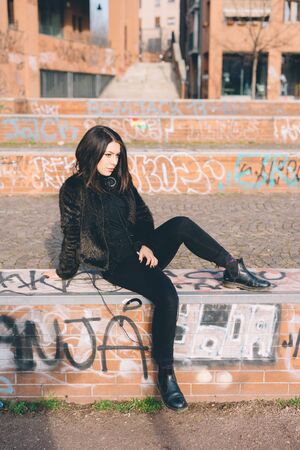 young beautiful woman in the cityの写真素材