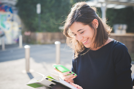 young pretty woman in townの写真素材