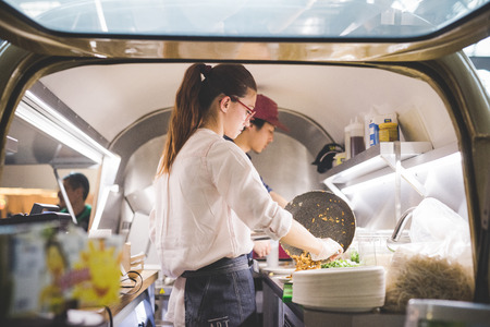 MILAN, ITALY - NOVEMBER 7: People visiting Eat Market, a street food parade with international dishes  in Milan on November, 21 2015.のeditorial素材