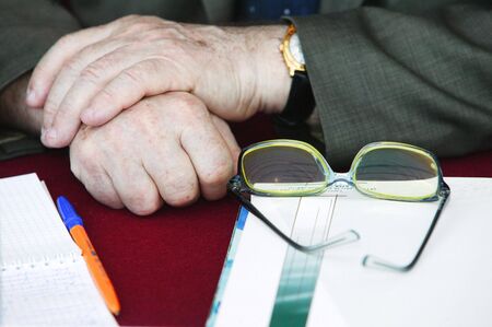 Mens hands. Pen. Pfper.の写真素材