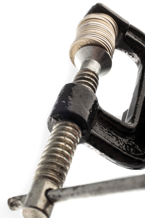 Ruble coin under pressure on the white background.の写真素材