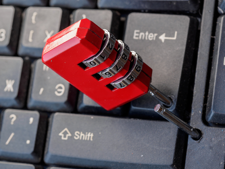 Computer keyboard and combination lock.の写真素材