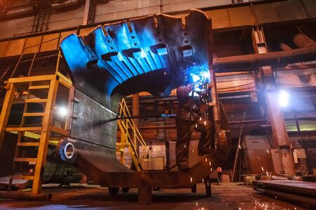 Giant excavator bucket in the workshop of the plant.