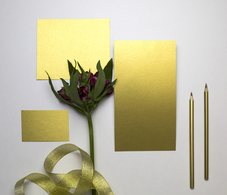 Set of gold paper cards with decor elements, top viewの写真素材
