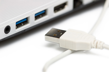 USB connecting to laptopの写真素材