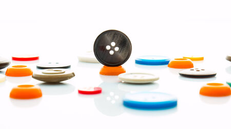 Multicolored clothes buttonsの写真素材