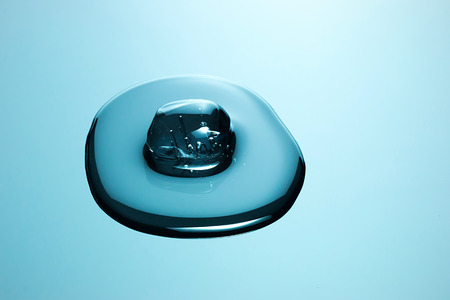 Ice melting on a mirror.の写真素材