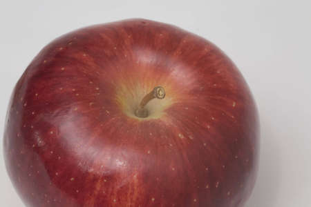 Ripe red apple on a white backgroundの写真素材