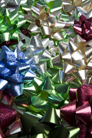 Pile of colorful christmas gift bows.の写真素材