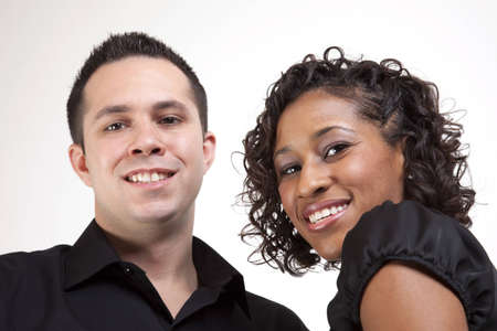 A male and female smiling in a happy poseの写真素材