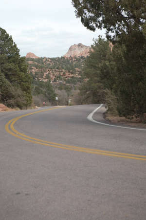 A downhill curve in a road in Colorado Springs, Colorado.の写真素材