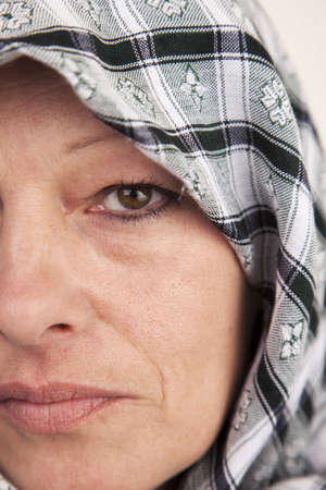 A woman wearing a mideast veil on headの写真素材