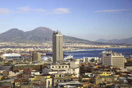 City of Naples  with skyscraper, harbor and Mount Vesuvius on the backgroundの写真素材