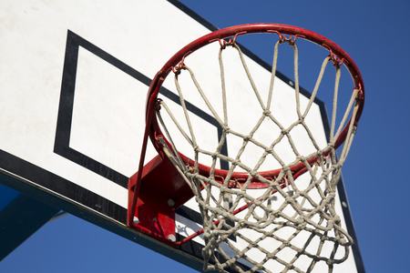 Basketball Hoop and Net on blue sky backgroundの写真素材