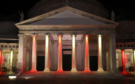 Naples, Italy, colored lights on the colonnade of St. Francis of Paola Church lit under the project 'National Flags and Anthems' to honor, through the flags and National Anthems, the EU member states.の写真素材