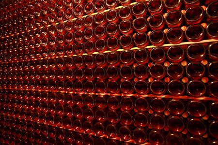 Empty sparkling wine bottlesの写真素材